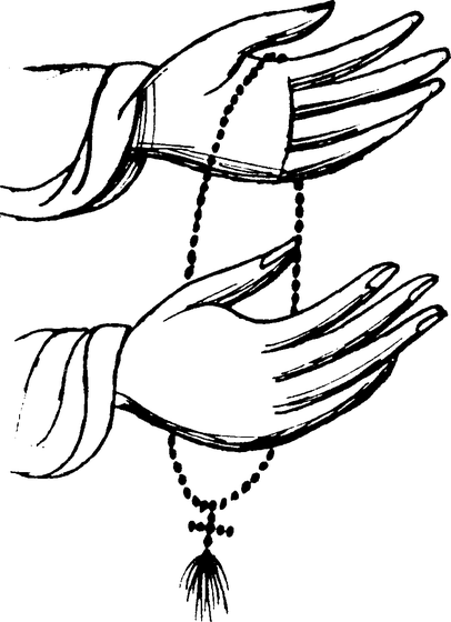 Two hands holding prayer ropes (komboskini), shown in detailed line work emphasizing the knotted construction and the gesture of prayer